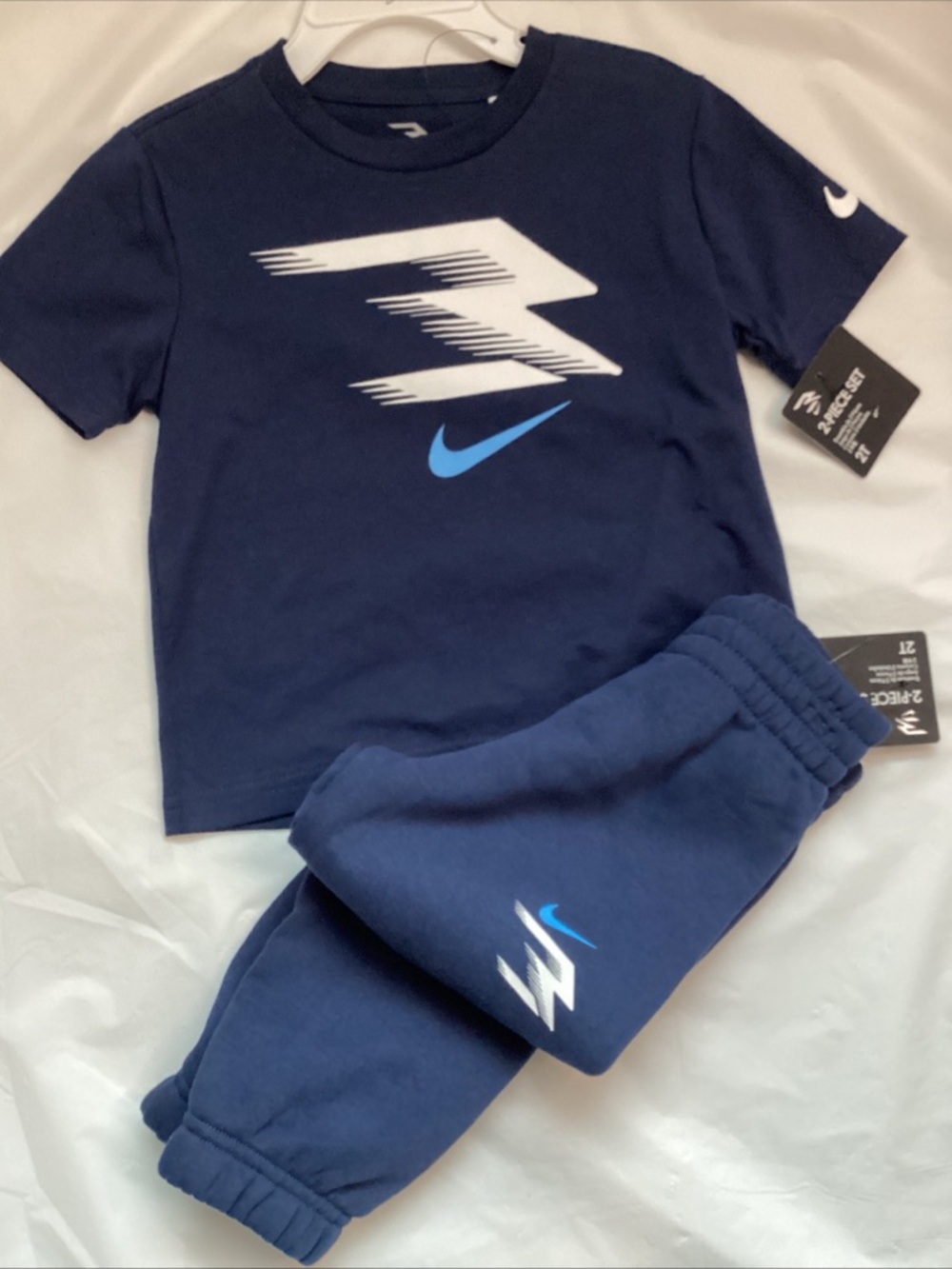 Nike Boys Navy Blue Two-Piece Jogger Set with White and Light Blue Logos